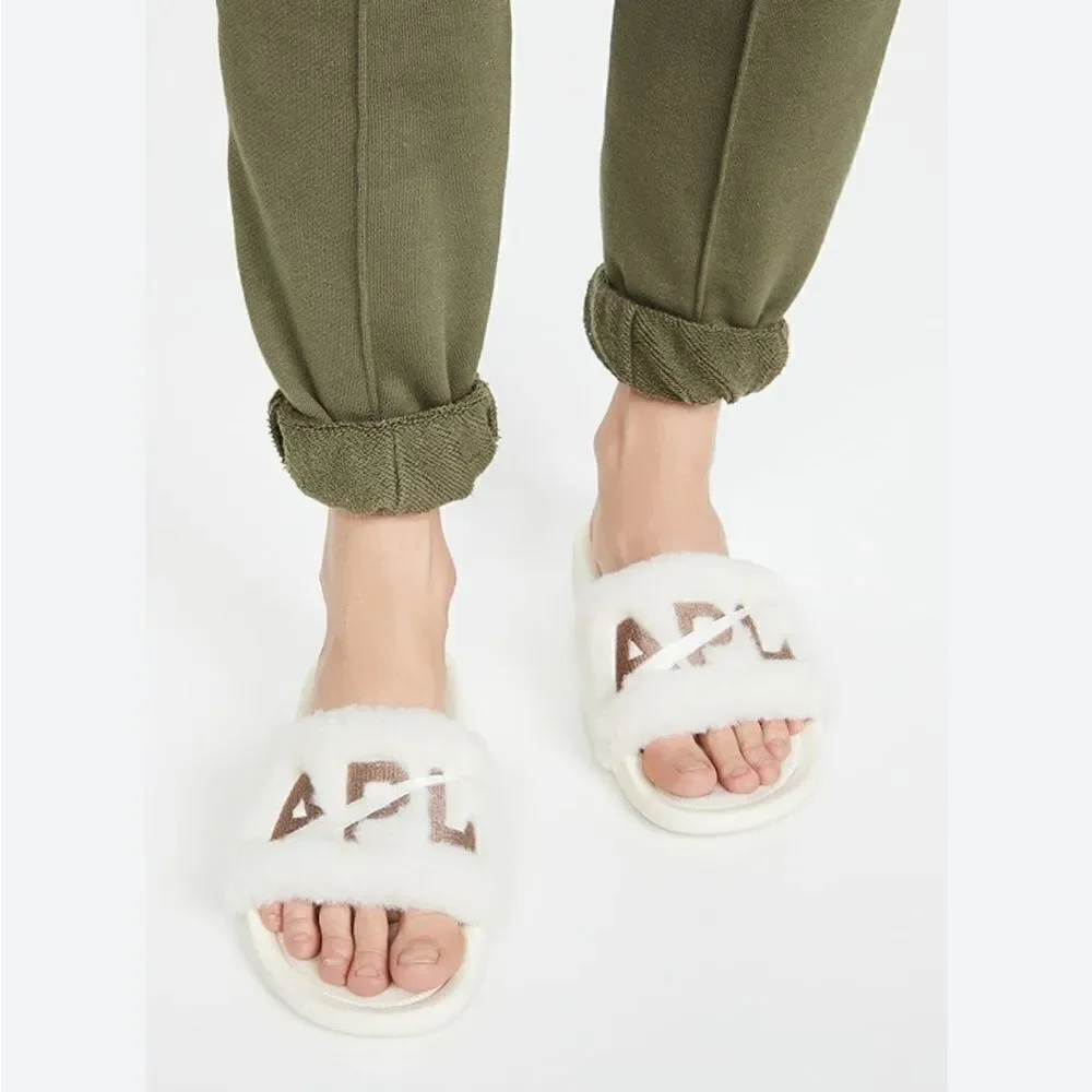 Revolve APL: Athletic Propulsion Labs Womens Shearling Slides - Pristine/Almond